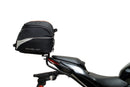 Ventura EVO-12 Bike-Pack Kit for Kawasaki Z 500 and Ninja 500 (all models, '24 onwards) includes a black EVO-12 PACK, metal Adjustable Pack-Rack (EVO-RACK), and metal L-Bracket supports with hardware shown in a generic image.