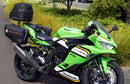 The Ventura EVO-12 Bike-Pack Kit for Kawasaki Ninja ZX-4RR, ZX-4R (25 - >) includes a black bike pack, rear Evo-Rack, sturdy metal L-Bracket with screws—all clearly labeled on a white background.