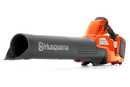 The Husqvarna 230iB blower with battery and charger is shown from the nozzle end on a white background, featuring an ergonomic design for comfortable extended use and the brand name visible along the side.