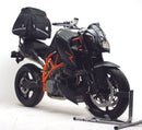 The Ventura EVO-12 Bike-Pack Kit for KTM 990 Super Duke R (05-12) includes a black EVO-12 pack with branding and secure zipper, plus an adjustable metallic pack-rack and L-bracket with screws for stable and easy integration.