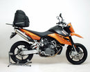 The KTM 990 Super Moto R (09-12) Bike-Pack Kit by Ventura features a sleek black design with vibrant orange accents, an Evo-Rack for seamless fit, and a sturdy L-Bracket including screws. Each component is individually labeled against a spotless white background.
