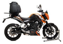 Image of a Ventura EVO-12 Bike-Pack Kit for KTM 390 Duke (13-16), featuring an EVO-12 pack with zippered closure, an EVO-RACK mounted on a motorcycle, and includes L-Bracket with screws for easy installation—ideal for adjustable pack-rack setup enthusiasts.