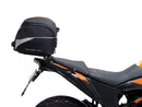 The image showcases a Ventura EVO-12 Bike-Pack Kit for the KTM 390 Adventure (2020 - >), including a black "EVO-12 PACK," an adaptable "Evo-Rack" metal rack, and an "L-BRACKET" with screws, blending practicality and style for any biking adventure.