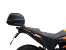 The image showcases a Ventura EVO-12 Bike-Pack Kit for the KTM 390 Adventure (2020 - >), including a black "EVO-12 PACK," an adaptable "Evo-Rack" metal rack, and an "L-BRACKET" with screws, blending practicality and style for any biking adventure.