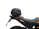 The image showcases a Ventura EVO-12 Bike-Pack Kit for the KTM 390 Adventure (2020 - >), including a black "EVO-12 PACK," an adaptable "Evo-Rack" metal rack, and an "L-BRACKET" with screws, blending practicality and style for any biking adventure.
