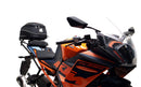 Ventura's EVO-12 Bike-Pack Kit for KTM RC 390 (22 ->) features a sleek black design with an orange stripe, an EVO-RACK for easy mounting, and an L-bracket with screws for seamless installation. It's perfect for riders seeking style and functionality.