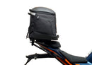 Ventura's EVO-12 Bike-Pack Kit for KTM RC 390 (22 ->) features a sleek black design with an orange stripe, an EVO-RACK for easy mounting, and an L-bracket with screws for seamless installation. It's perfect for riders seeking style and functionality.
