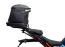 Ventura's EVO-12 Bike-Pack Kit for KTM RC 390 (22 ->) features a sleek black design with an orange stripe, an EVO-RACK for easy mounting, and an L-bracket with screws for seamless installation. It's perfect for riders seeking style and functionality.