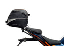 Ventura's EVO-12 Bike-Pack Kit for KTM RC 390 (22 ->) features a sleek black design with an orange stripe, an EVO-RACK for easy mounting, and an L-bracket with screws for seamless installation. It's perfect for riders seeking style and functionality.