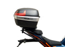 Ventura's EVO-12 Bike-Pack Kit for KTM RC 390 (22 ->) features a sleek black design with an orange stripe, an EVO-RACK for easy mounting, and an L-bracket with screws for seamless installation. It's perfect for riders seeking style and functionality.