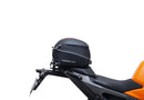 Image showing a Ventura EVO-12 Bike-Pack Kit for KTM 990 Duke (24 - >) with three components: EVO-12 pack bag, Evo-Rack mounted on the motorcycle, and L-brackets with screws. Generic image shown.