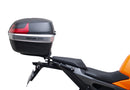 Image showing a Ventura EVO-12 Bike-Pack Kit for KTM 990 Duke (24 - >) with three components: EVO-12 pack bag, Evo-Rack mounted on the motorcycle, and L-brackets with screws. Generic image shown.