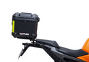Image showing a Ventura EVO-12 Bike-Pack Kit for KTM 990 Duke (24 - >) with three components: EVO-12 pack bag, Evo-Rack mounted on the motorcycle, and L-brackets with screws. Generic image shown.