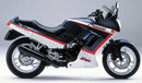 Image of the Ventura EVO-12 Bike-Pack Kit for Kawasaki GPX 250, featuring a black EVO-12 bag, Sport-Rack for bike attachment, and a black L-bracket with mounting screws.