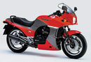 The image showcases a Ventura Kawasaki GPZ 900 R Bike-Pack Kit, featuring a sleek black pack with an eye-catching orange stripe. Included is the versatile Evo-Rack and a robust L-Bracket with screws, ensuring secure attachment for all your cycling adventures.