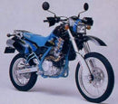 Image of the Ventura EVO-12 Bike-Pack Kit for Kawasaki KLX 650, featuring an EVO-12 pack with orange stripe, an Evo-Rack, and a labeled "L-Bracket" with screws. The Sport-Rack is displayed on a bike for secure and adventurous rides.