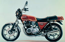 Image of a Ventura EVO-12 Bike-Pack Kit showcasing a sleek black EVO-12 pack with zippers, an Evo-Rack for mounting, and a generic L-bracket with screws, each clearly labeled against a white background. Compatible with Kawasaki Z 1000 MK.2 A1, A2.