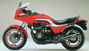 Image of a Ventura Kawasaki GPZ 1100 Bike-Pack Kit featuring a sleek black bike pack, the robust EVO-RACK bike rack, and durable L-brackets with screws labeled "L-BRACKET.