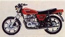 The Kawasaki Z 440 C Bike-Pack Kit by Ventura includes a stylish black bike pack with orange accents, an adaptable Evo-Rack for rear mounting, and a universal L-bracket with screws.