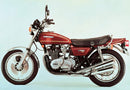 The Ventura EVO-12 Bike-Pack Kit for the Kawasaki Z 750 E includes a stylish black bag with red trim, a sturdy Evo-Rack, and an L-Bracket with screws and bolts for simple assembly, ensuring secure attachment on all adventures.