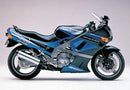The Ventura EVO-12 Bike-Pack Kit for the Kawasaki ZZR 600 (ZX600 E1 - E7) includes a sleek black EVO-12 Pack, an adjustable Pack-Rack, and a separate L-Bracket with mounting screws for easy motorcycle installation. Components are clearly labeled for convenience.