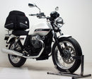 The image features a Moto Guzzi 750 V7 Stone (12-13) bike pack kit by Ventura, showcasing a sleek black design with orange accents and labeled "EVO-12 PACK." It includes an adjustable L-bracket with screws and an EVO-RACK bike rack, ideal for enhancing your cycling experience.