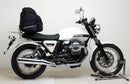 The image features a Moto Guzzi 750 V7 Stone (12-13) bike pack kit by Ventura, showcasing a sleek black design with orange accents and labeled "EVO-12 PACK." It includes an adjustable L-bracket with screws and an EVO-RACK bike rack, ideal for enhancing your cycling experience.