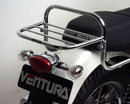 The image features a Moto Guzzi 750 V7 Stone (12-13) bike pack kit by Ventura, showcasing a sleek black design with orange accents and labeled "EVO-12 PACK." It includes an adjustable L-bracket with screws and an EVO-RACK bike rack, ideal for enhancing your cycling experience.