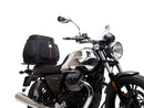 The EVO-12 Bike-Pack Kit includes the versatile EVO-Rack and a black EVO-12 Pack with a zippered compartment. It also comes with an L-Bracket and screws for easy installation on your Ventura Moto Guzzi 750 V7 III Milano's Sport-Rack system, ensuring secure storage for your adventures.
