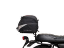 The EVO-12 Bike-Pack Kit includes the versatile EVO-Rack and a black EVO-12 Pack with a zippered compartment. It also comes with an L-Bracket and screws for easy installation on your Ventura Moto Guzzi 750 V7 III Milano's Sport-Rack system, ensuring secure storage for your adventures.