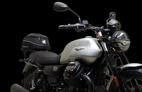 The image showcases the Moto Guzzi V7 Special (21 ->) Bike-Pack Kit by Ventura, featuring an EVO-12 pack and adaptable EVO-RACK, along with a generic image of an L-bracket with screws.