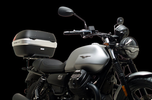The image showcases the Moto Guzzi V7 Special (21 ->) Bike-Pack Kit by Ventura, featuring an EVO-12 pack and adaptable EVO-RACK, along with a generic image of an L-bracket with screws.