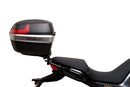 The Ventura EVO-12 Bike-Pack Kit for Moto Guzzi V100, V100S Mandello (22 - >) includes a black EVO-12 pack, a black Evo-Rack or Adjustable Pack-Rack mounted on the motorcycle, and an image of a labeled L-bracket with hardware.