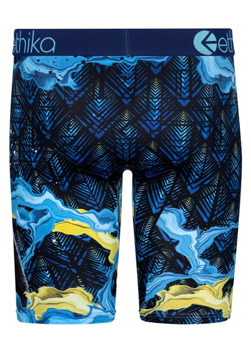 A pair of Ethika Kingdom Staple men's boxer briefs from Ethika, featuring two bears—one roaring and the other adorned with a gold crown and chain necklace. The background showcases abstract patterns with blue, black, and yellow swirls. Crafted for ultimate comfort with Staple Fit and a high-quality jacquard waistband.