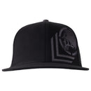 A Metal Mulisha Sketched Flex Hat in black, featuring a flat bill and an embroidered monochrome skull wearing a helmet on the side. The front showcases an embroidered stylized dodo bird within a circular frame, giving it a distinctive edgy look reminiscent of the Metal Mulisha brand.