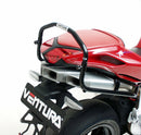 Image of the Ventura MV Agusta 1000 F4R (12-14) Pack-Rack Kit featuring a black bike pack labeled "EVO-12 Pack," a black metal EVO-Rack, and adjustable black metal L-Brackets with screws. Ideal for anyone seeking a dependable Adjustable Pack-Rack solution.