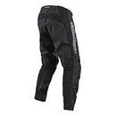 The Troy Lee Designs GP PANT MONO BLACK features breathable fabric, reinforced knees, a white side logo, waist closure, visible seams for durability, and a tapered fit—ideal motocross riding gear.