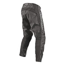 The Troy Lee Designs GP Pant Mono Gray | Youth features black and gray lightweight race pants with reinforced knees, breathable fabric, mesh panels, and a white "Troy Lee Designs" logo on the right leg, shown on a white background.