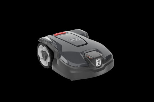 A sleek, dark gray Husqvarna Automower® 310 Mark II robotic lawn mower with two large rear wheels and a Husqvarna logo on the front, displayed on a plain, transparent background.