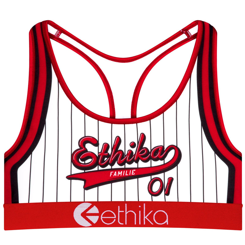 The Ethika Women’s Play Ball Sports Bra from Ethika features black vertical stripes on a white background, crafted from Performance Subzero Fabric. It includes red details on the straps and hem, with "Ethika" written in red cursive text across the chest. The number "01" and the words "FAMILIE" and "ethika" are also displayed on it.