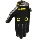 OWLS THAT GLOVE by FIST features a repeating owl face pattern with bright yellow eyes and bold yellow "FIST" lettering across the knuckles—ideal motocross gloves for standout style and top performance.