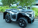 The Ventura CF Moto C Force 625 (2020) is a black and silver ATV with large off-road tires, protective bull-bars, a sturdy frame, mirrors on the handlebars, and a blue tow strap at the front. Custom mud flaps add flair to its rugged design as it sits parked on the pavement.
