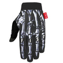 The SETH ENSLOW PAIN & LOVE GLOVE by FIST features a black design with a white skeleton hand on top, "FIST" printed across the fingers, and a red "FIST" side tag—ideal for MTB glove enthusiasts seeking both style and grip.