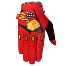 The FIST PECKER GLOVE is a red MTB glove with "FIST" in yellow on the fingers, a yellow fist, flames, and checkered flag graphic on the back. The cuff has a black-and-white checkered pattern—ideal for motocross and mountain biking.