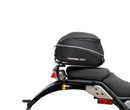 Image displaying Ventura's EVO-12 Bike-Pack Kit for the Royal Enfield Himalayan 410 (17->) includes a black Adjustable Pack-Rack, a metal Evo-Rack mounted on a bike, and an L-Bracket with screws.