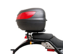 Image displaying Ventura's EVO-12 Bike-Pack Kit for the Royal Enfield Himalayan 410 (17->) includes a black Adjustable Pack-Rack, a metal Evo-Rack mounted on a bike, and an L-Bracket with screws.
