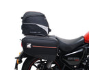 The image showcases the "Royal Enfield Meteor 350 (21 - >)," featuring a sleek black bike pack with a logo, sturdy Evo-Rack, and L-Bracket. Each component, including screws and pannier support, is labeled in vivid red text for easy identification by Ventura.