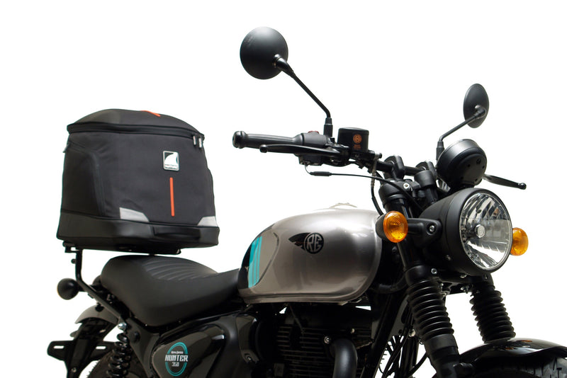 The Ventura EVO-12 Bike-Pack Kit for the Royal Enfield Hunter 350 (22 ->) includes a black soft-sided pack, an Adjustable Pack-Rack with mounting points, and an L-Bracket with screws and assembly parts.