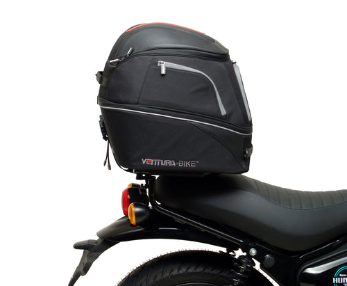 The Ventura EVO-12 Bike-Pack Kit for the Royal Enfield Hunter 350 (22 ->) includes a black soft-sided pack, an Adjustable Pack-Rack with mounting points, and an L-Bracket with screws and assembly parts.