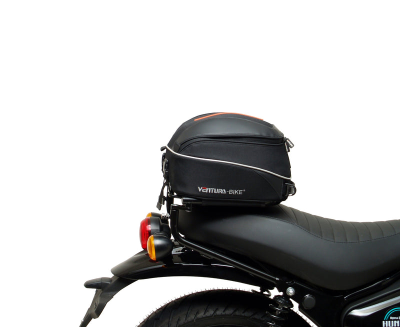 The Ventura EVO-12 Bike-Pack Kit for the Royal Enfield Hunter 350 (22 ->) includes a black soft-sided pack, an Adjustable Pack-Rack with mounting points, and an L-Bracket with screws and assembly parts.